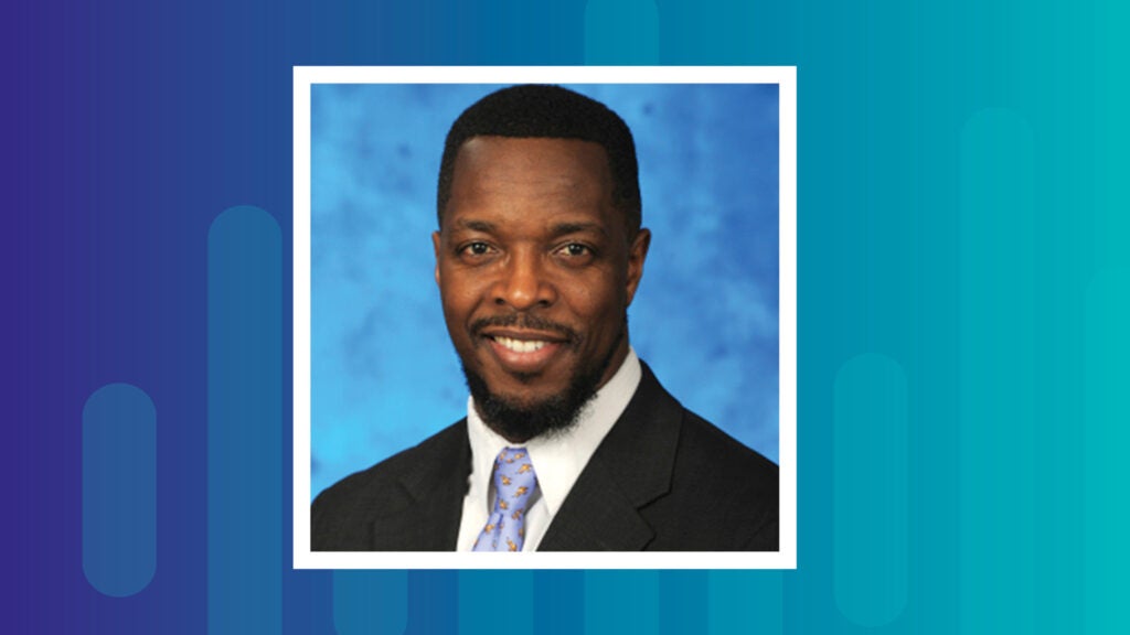 Headshot of Anthony Love, then-Interim Executive Director of USICH (U.S. Interagency Council on Homelessness).