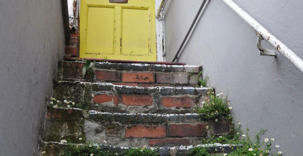 Photo of stairs leading to a doorway