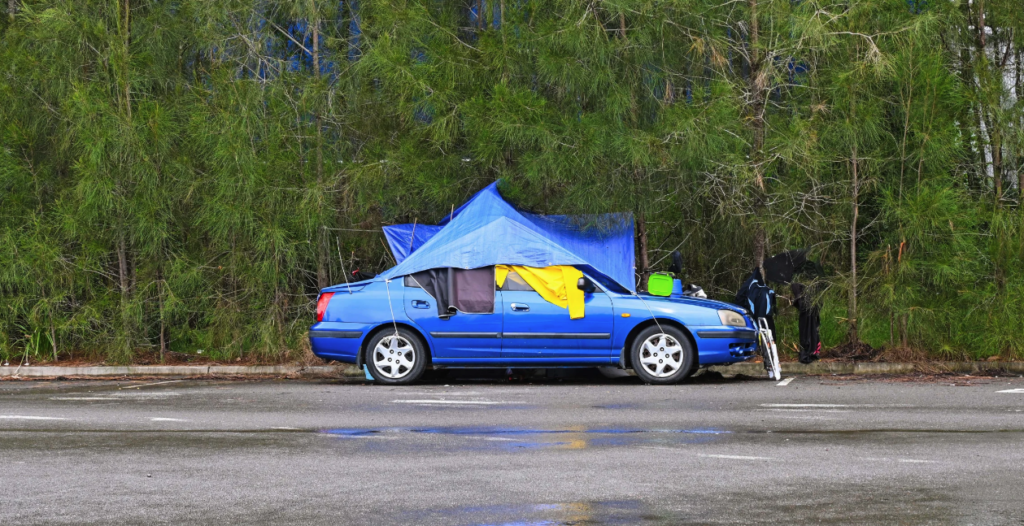 Photo of a car used as housing.