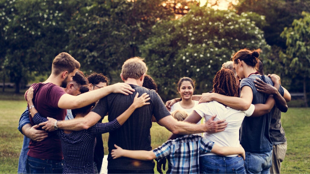 Photo of teens engaging in Catholic Parish activities.