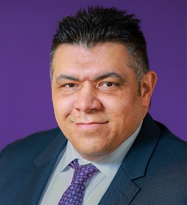 Photo of Luis Marquez who works on Catholic Charities real estate donations. 