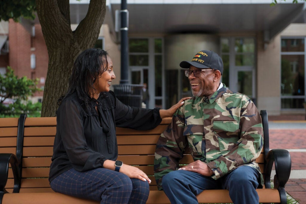CCUSA-WomanTalkingToVeteranRGB-2-1024×683