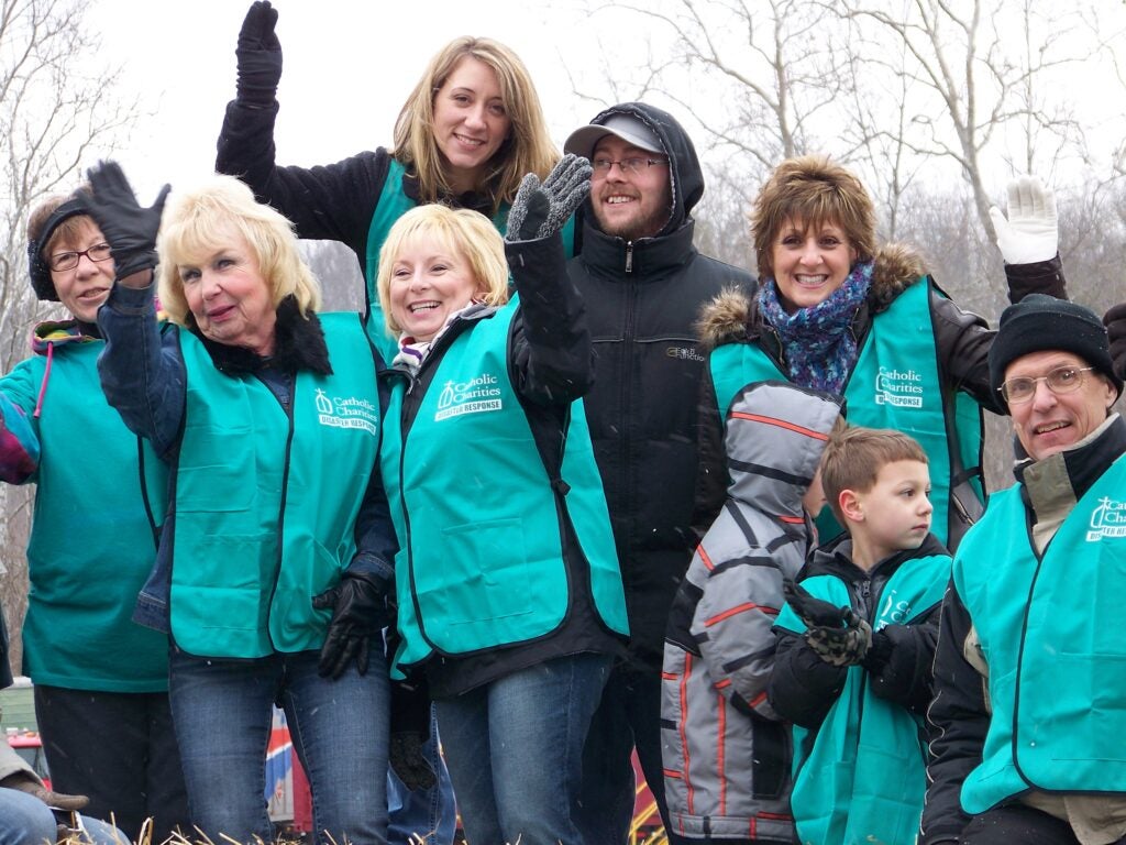 The disaster case management team from Catholic Charities Archdiocese of Indianapolis smiles for the camera
